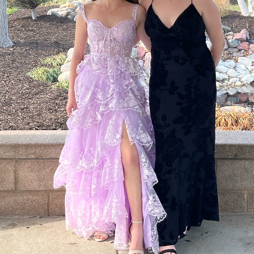 Purple lace maxi dress with ruffle hem #prom
corset back tie